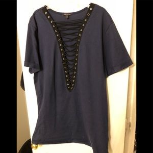 Navy blue top with rope detail front.
